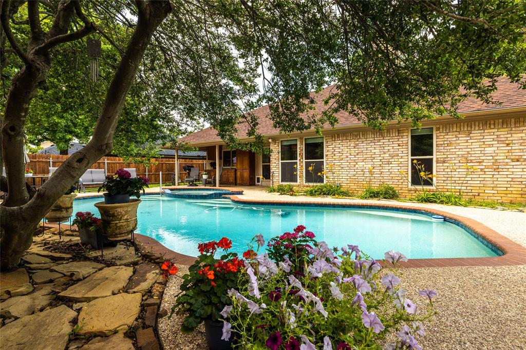 front view of a house with a swimming pool