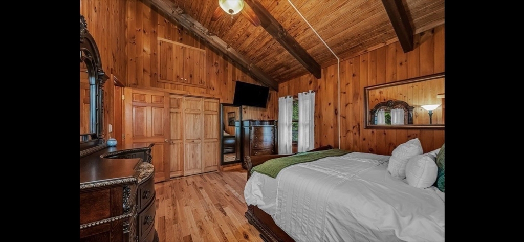 1828 East Otis Road Otis, MA 01029 - Photo 12 of 25 a bedroom with a bed and a window