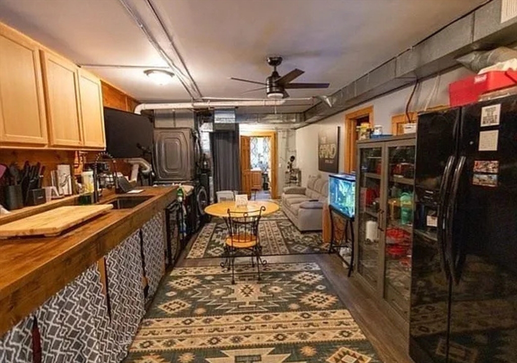 1828 East Otis Road Otis, MA 01029 - Photo 15 of 25 a hallway with lots of bottles of alcohol