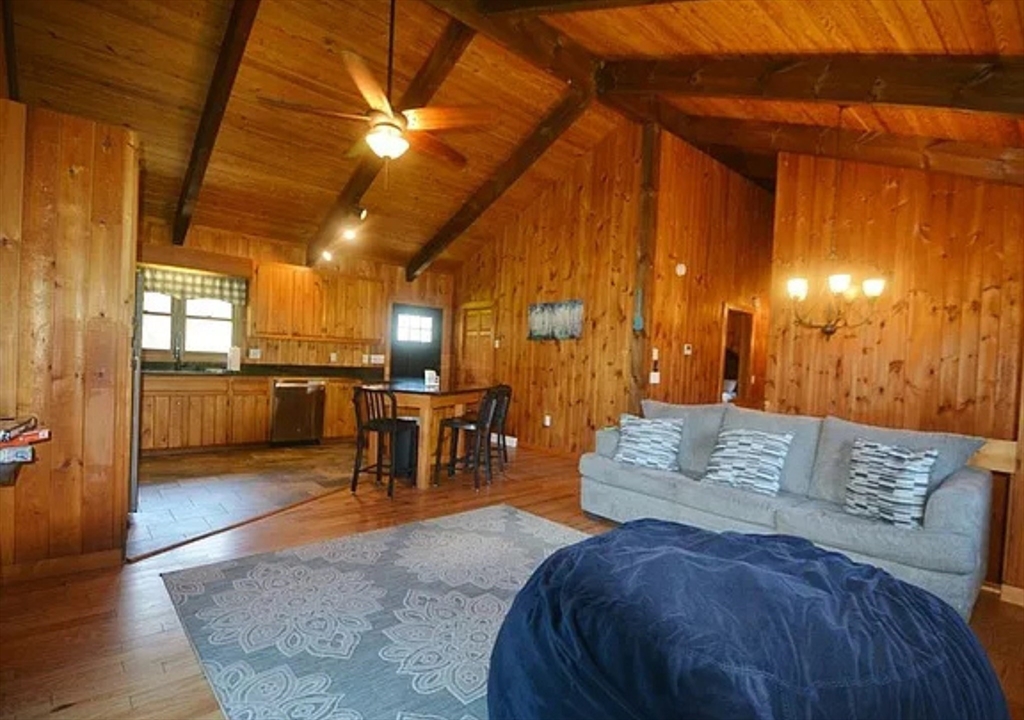1828 East Otis Road Otis, MA 01029 - Photo 7 of 25 a living room with furniture and kitchen view