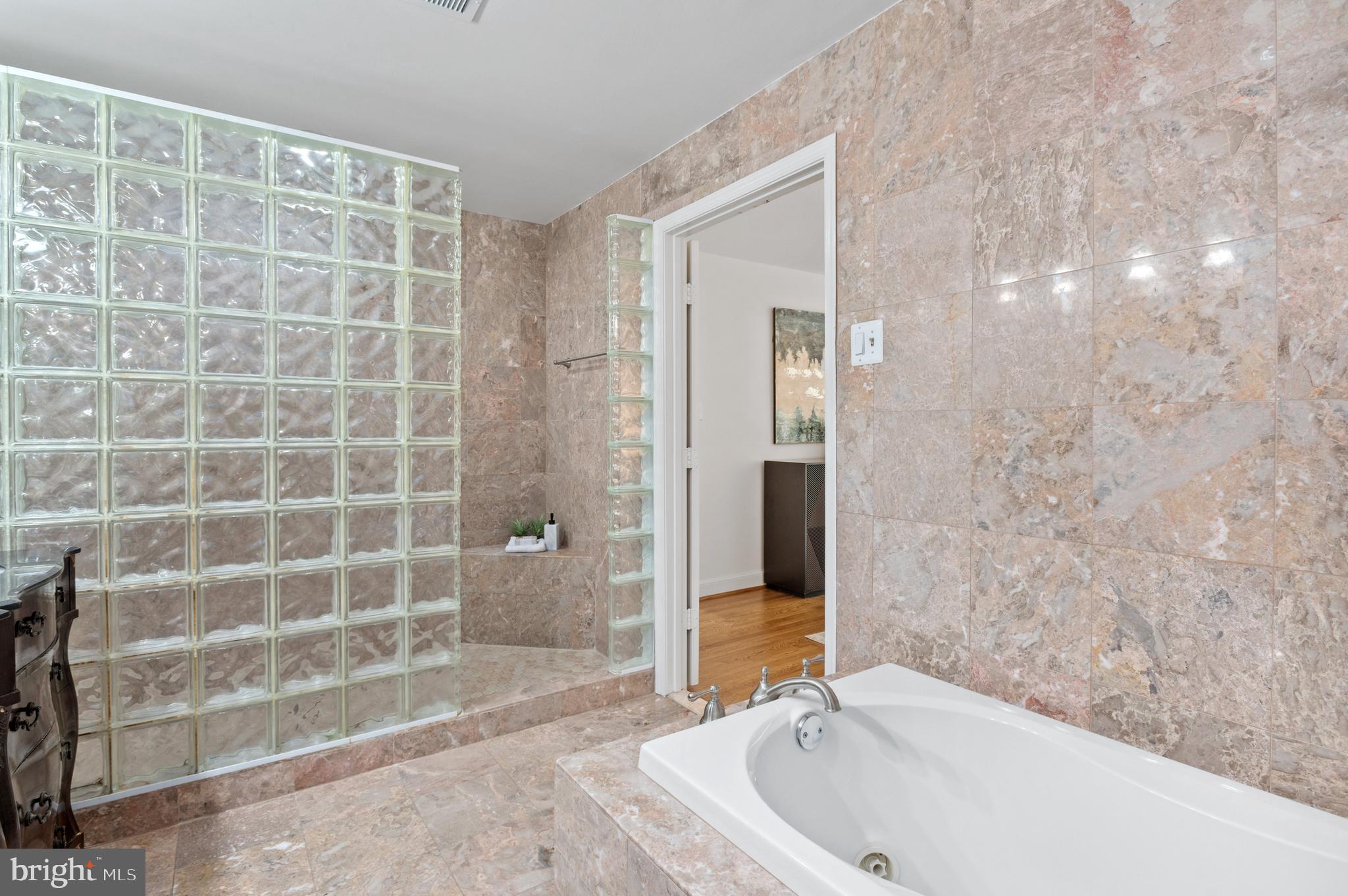 3729 Winfield Lane Northwest Washington, DC 20007 - Photo 13 of 22 a bathroom with a bathtub and shower