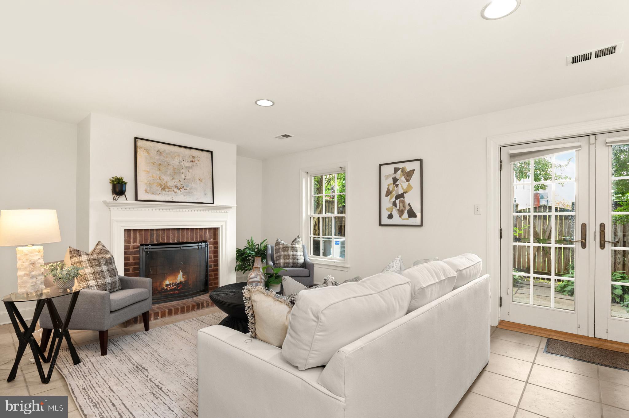 3729 Winfield Lane Northwest Washington, DC 20007 - Photo 17 of 22 a living room with furniture and a fireplace
