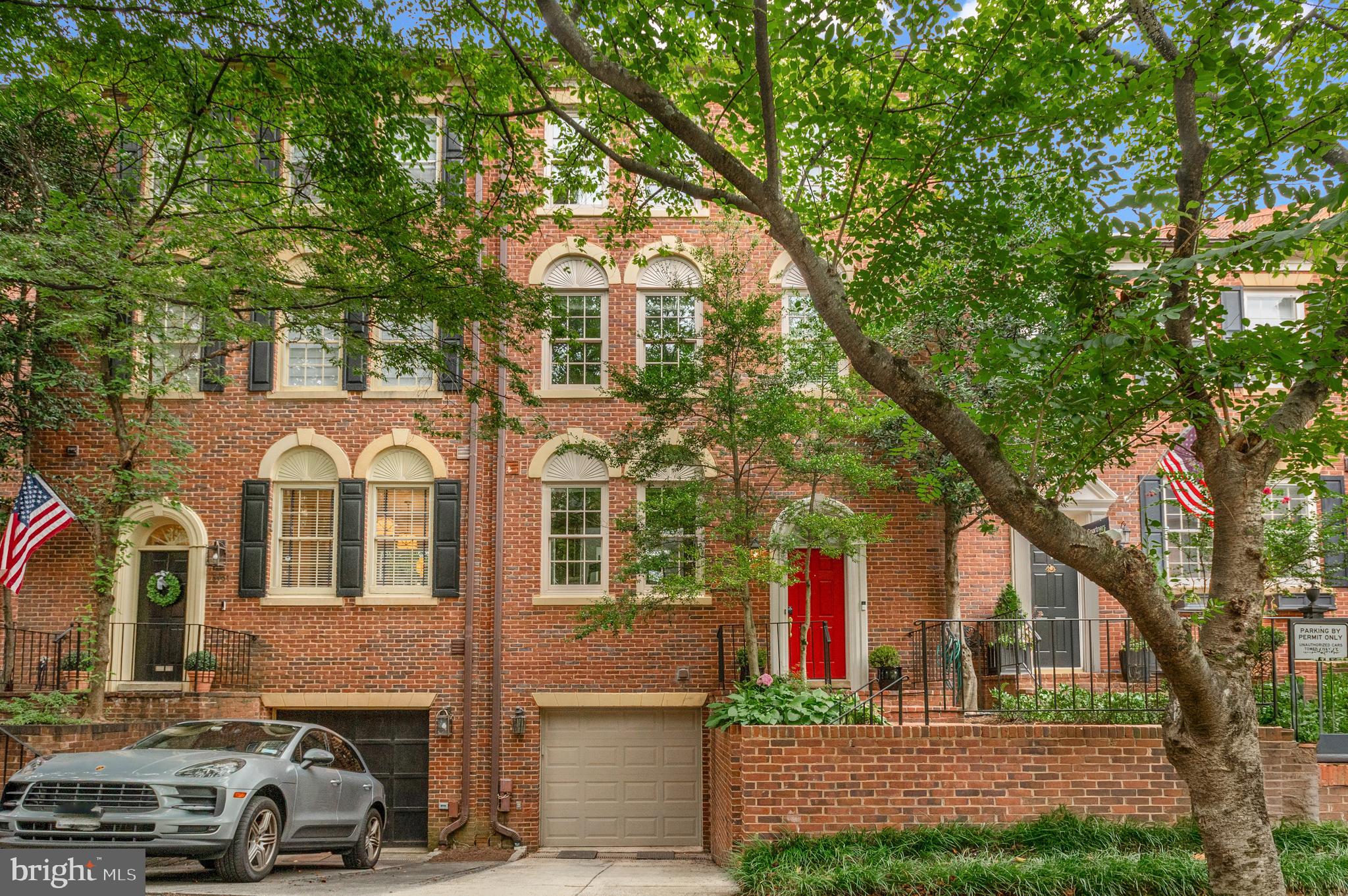 3729 Winfield Lane Northwest Washington, DC 20007 - Photo 22 of 22 a front view of a residential apartment building with a yard