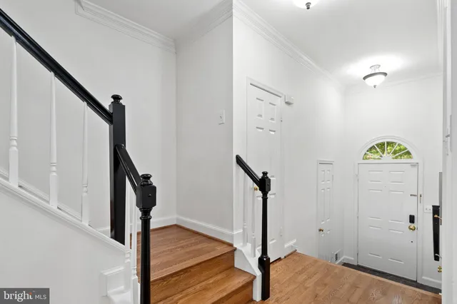 a view of a hallway with entryway