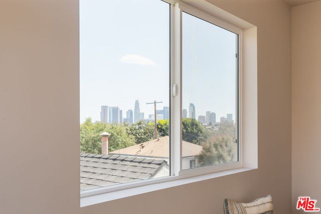 a view of a room next to a window