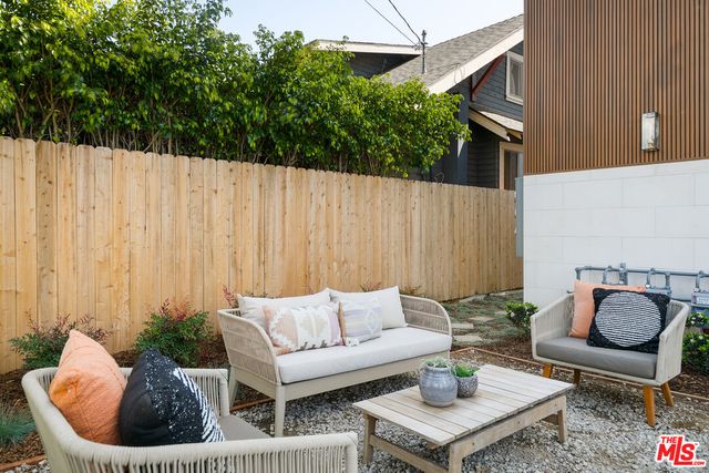a view of outdoor sitting area with furniture and couch