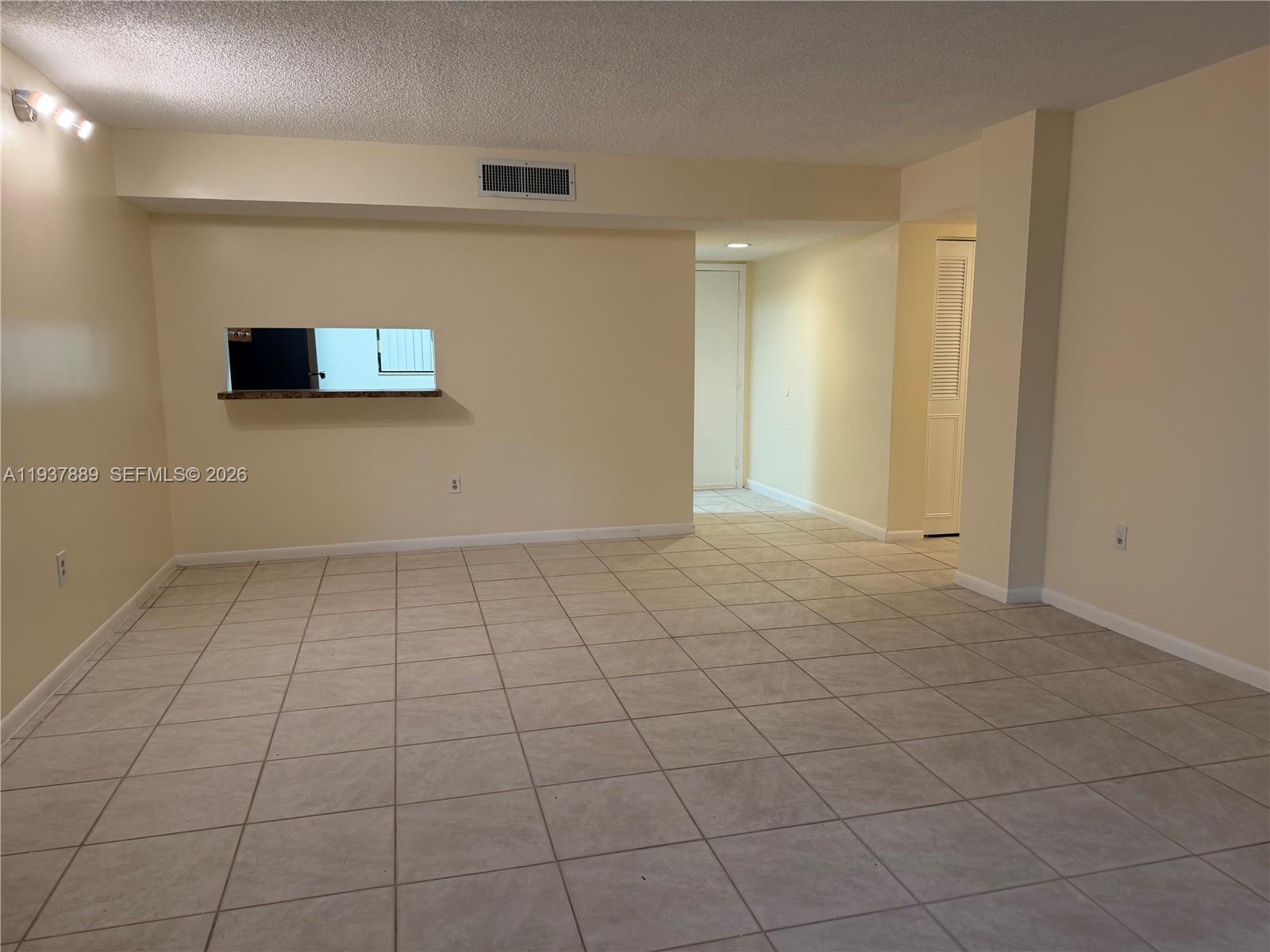 8500 Southwest 133rd Avenue Road, Unit 122 Miami, FL 33183 - Photo 16 of 22 a view of an empty room