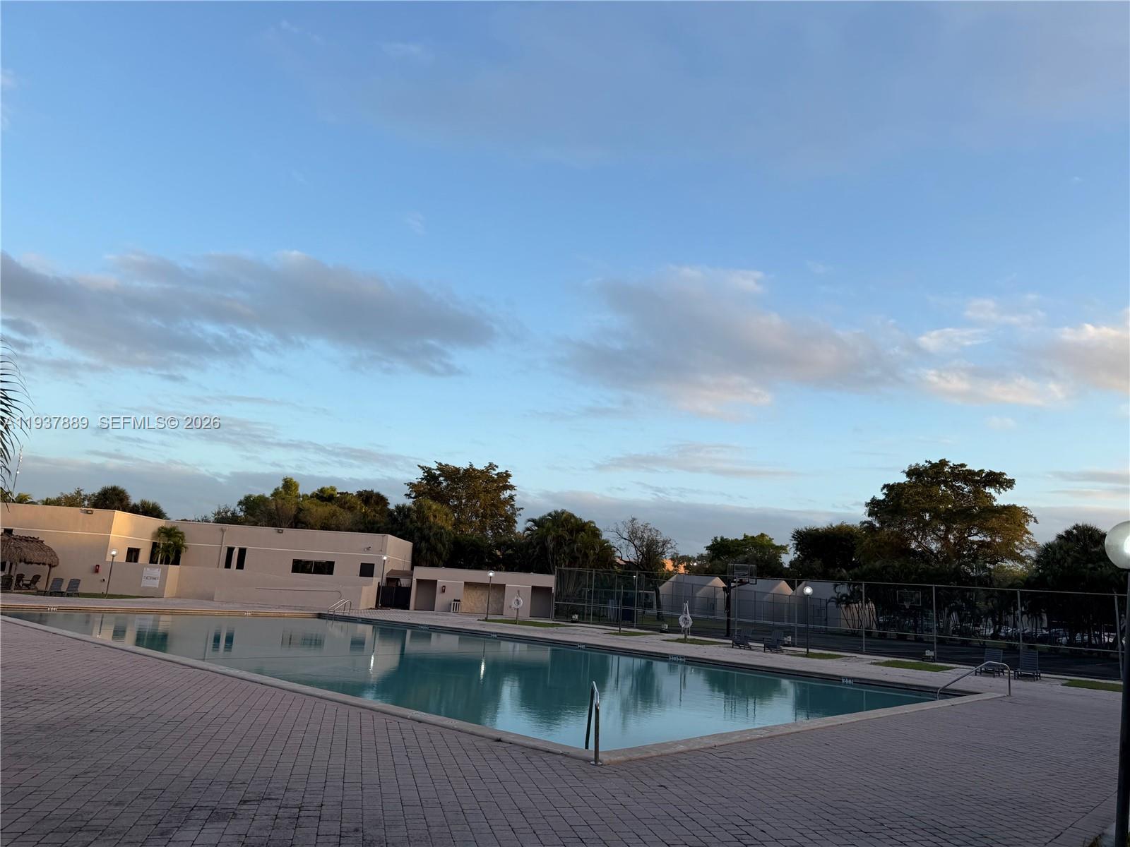 8500 Southwest 133rd Avenue Road, Unit 122 Miami, FL 33183 - Photo 4 of 22 a view of a lake with houses