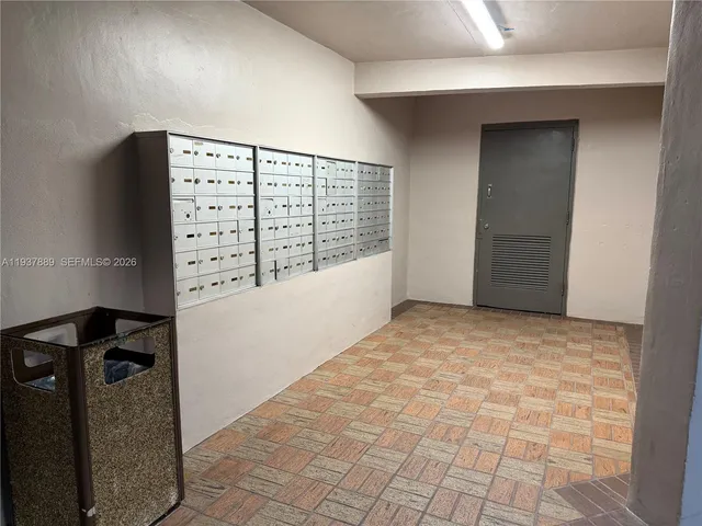 a stove top oven sitting inside of a kitchen