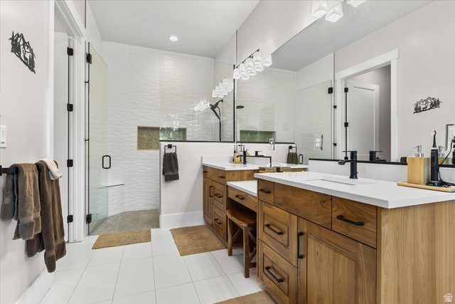 1210 East Bristle Cone Road Pine Valley, UT 84781 - Photo 15 of 54 Primary Bathroom featuring two vanities, a shower stall, and light tile patterned flooring