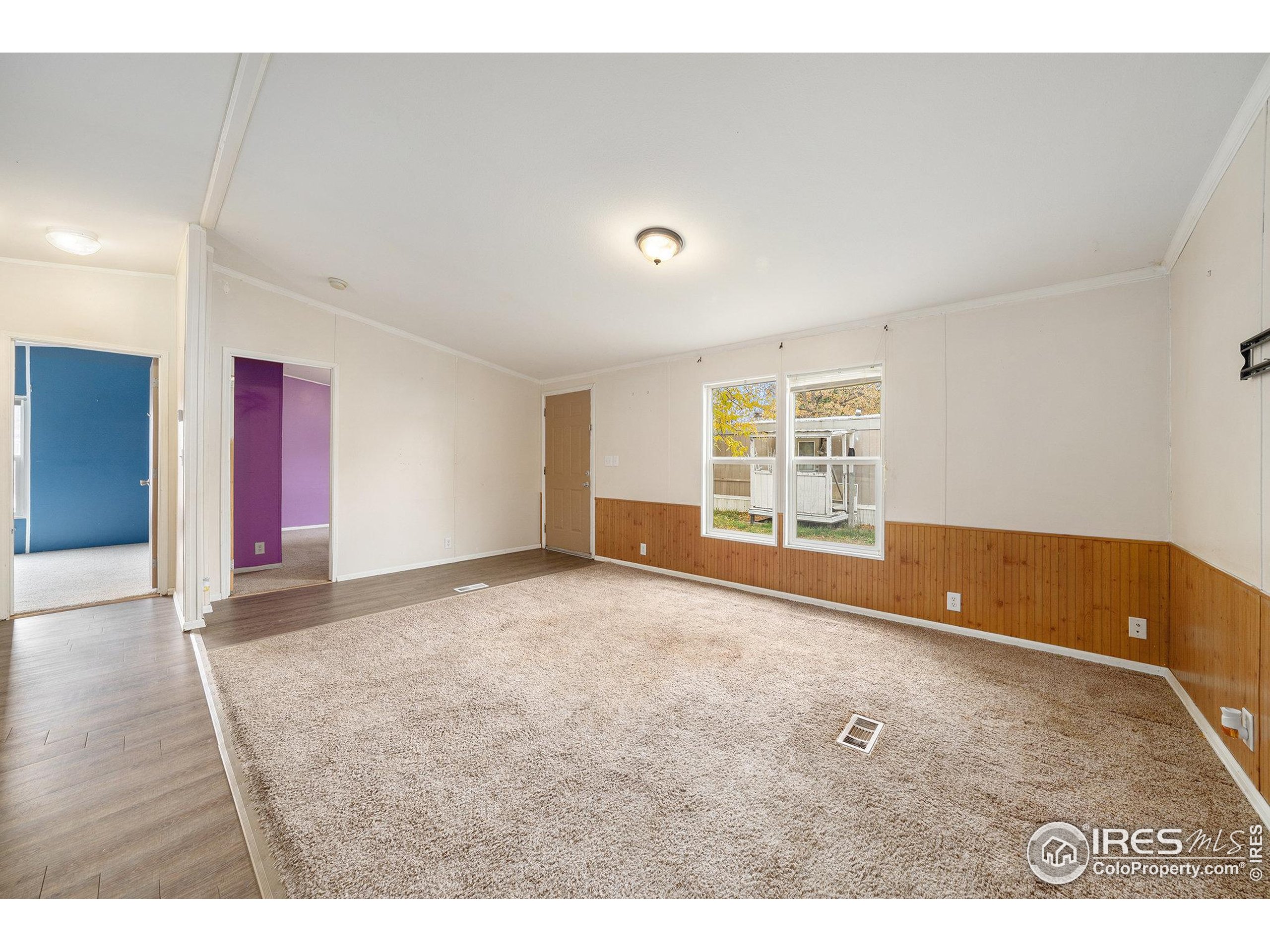 2500 East Harmony Road, Unit 191 Fort Collins, CO 80528 - Photo 12 of 22 a view of an empty room with a window