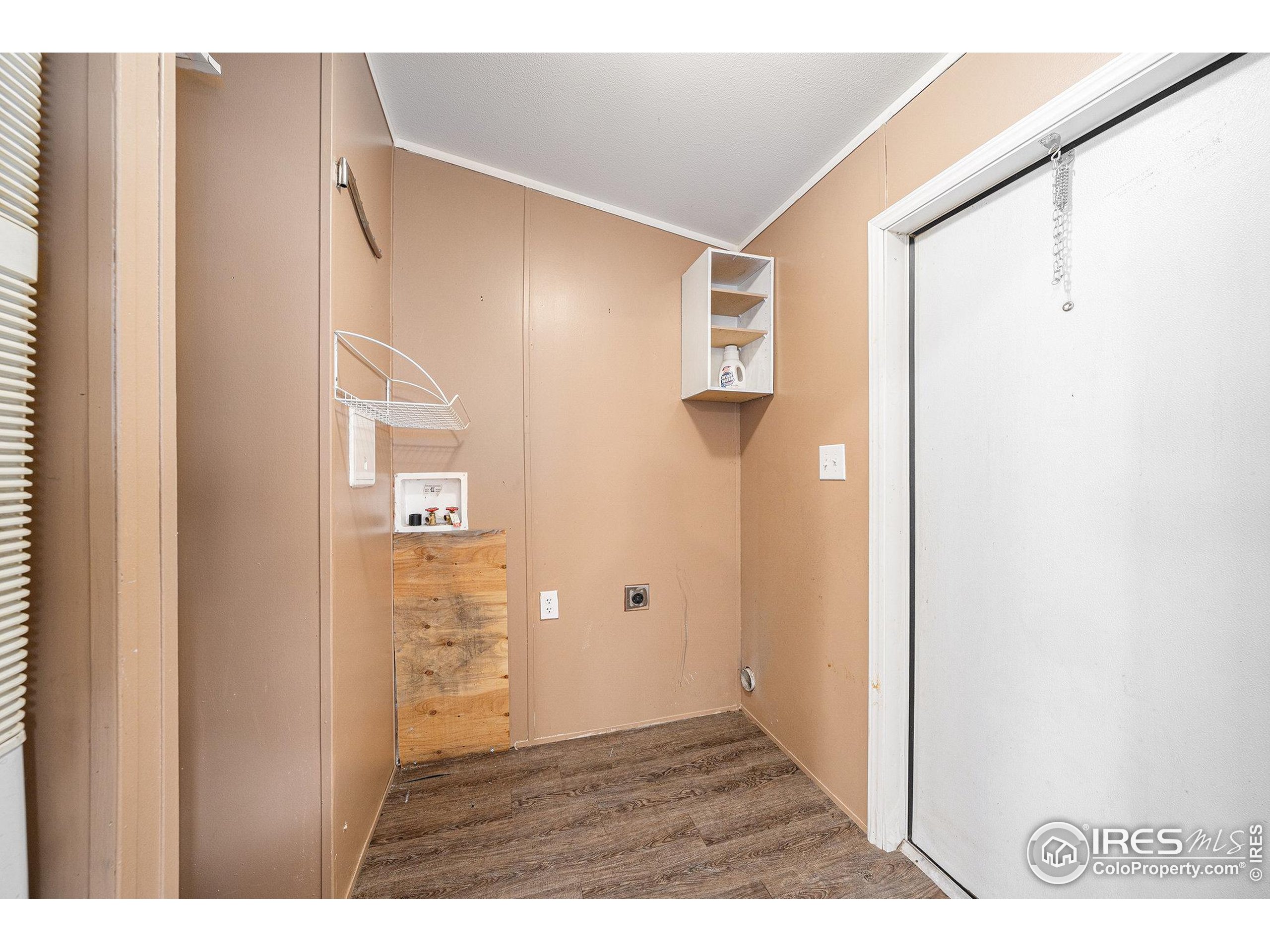 2500 East Harmony Road, Unit 191 Fort Collins, CO 80528 - Photo 18 of 22 a view of an empty room with wooden floor