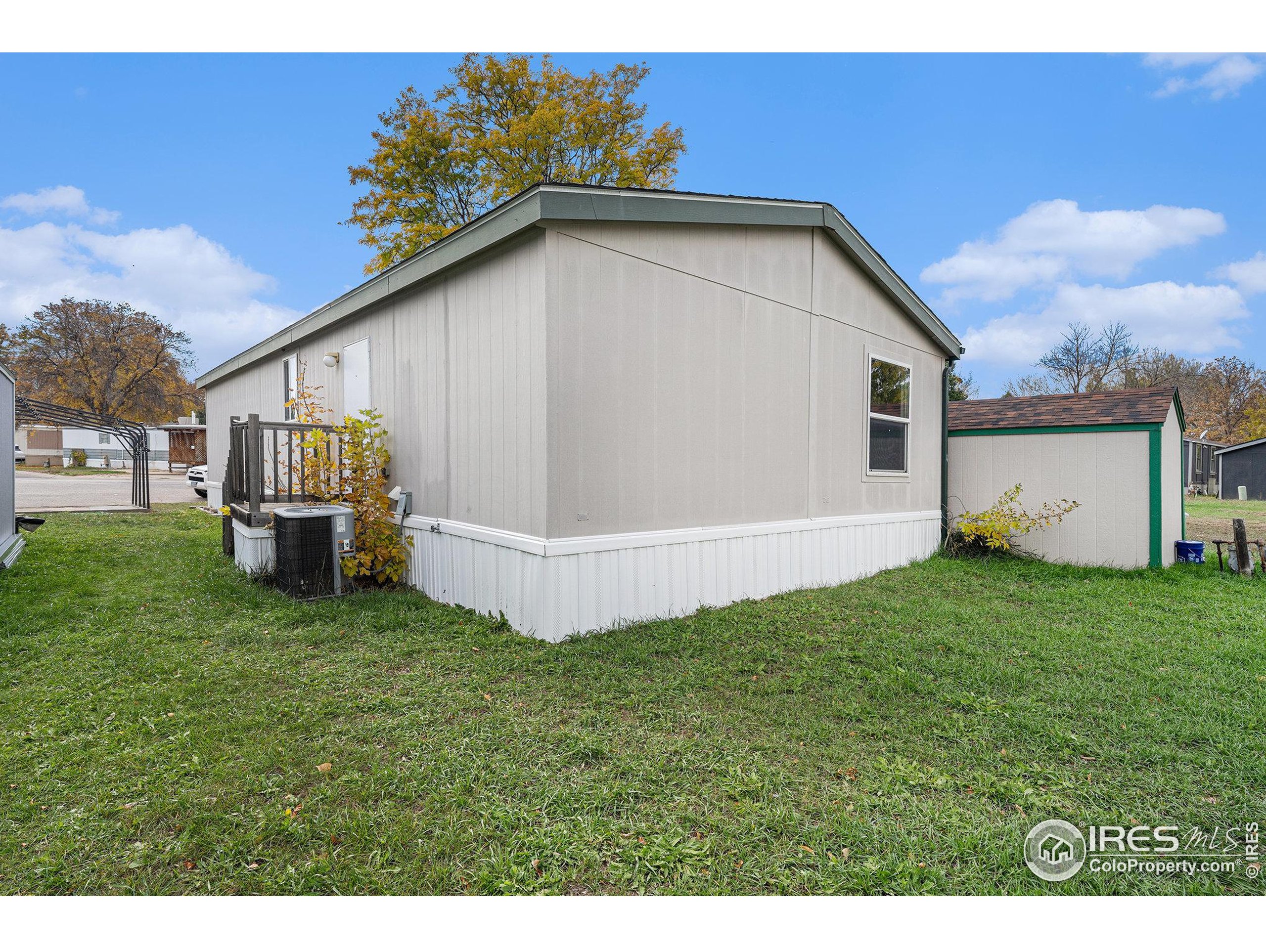 2500 East Harmony Road, Unit 191 Fort Collins, CO 80528 - Photo 20 of 22 a view of a house with backyard