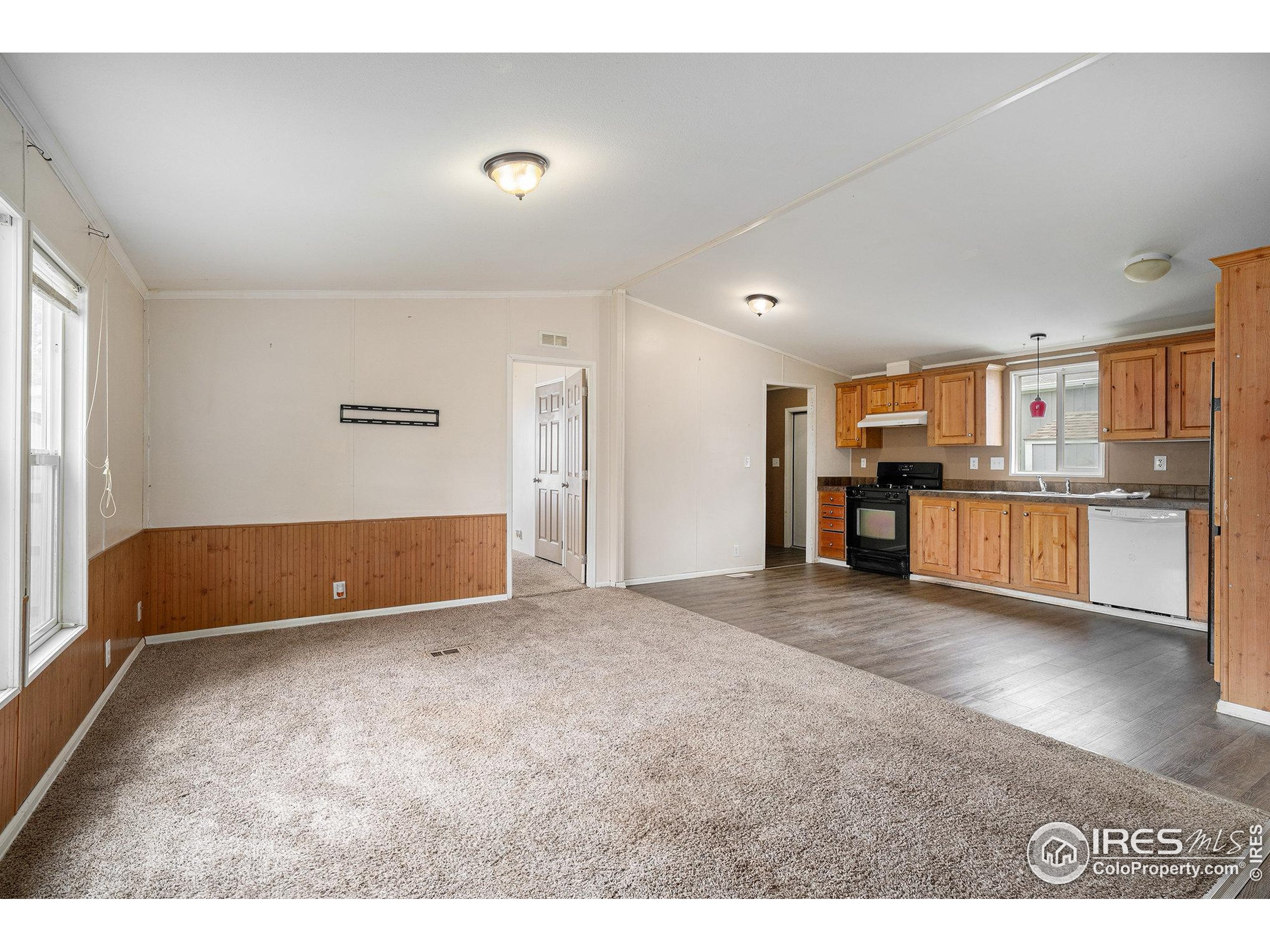 2500 East Harmony Road, Unit 191 Fort Collins, CO 80528 - Photo 4 of 22 a view of kitchen and kitchen with furniture
