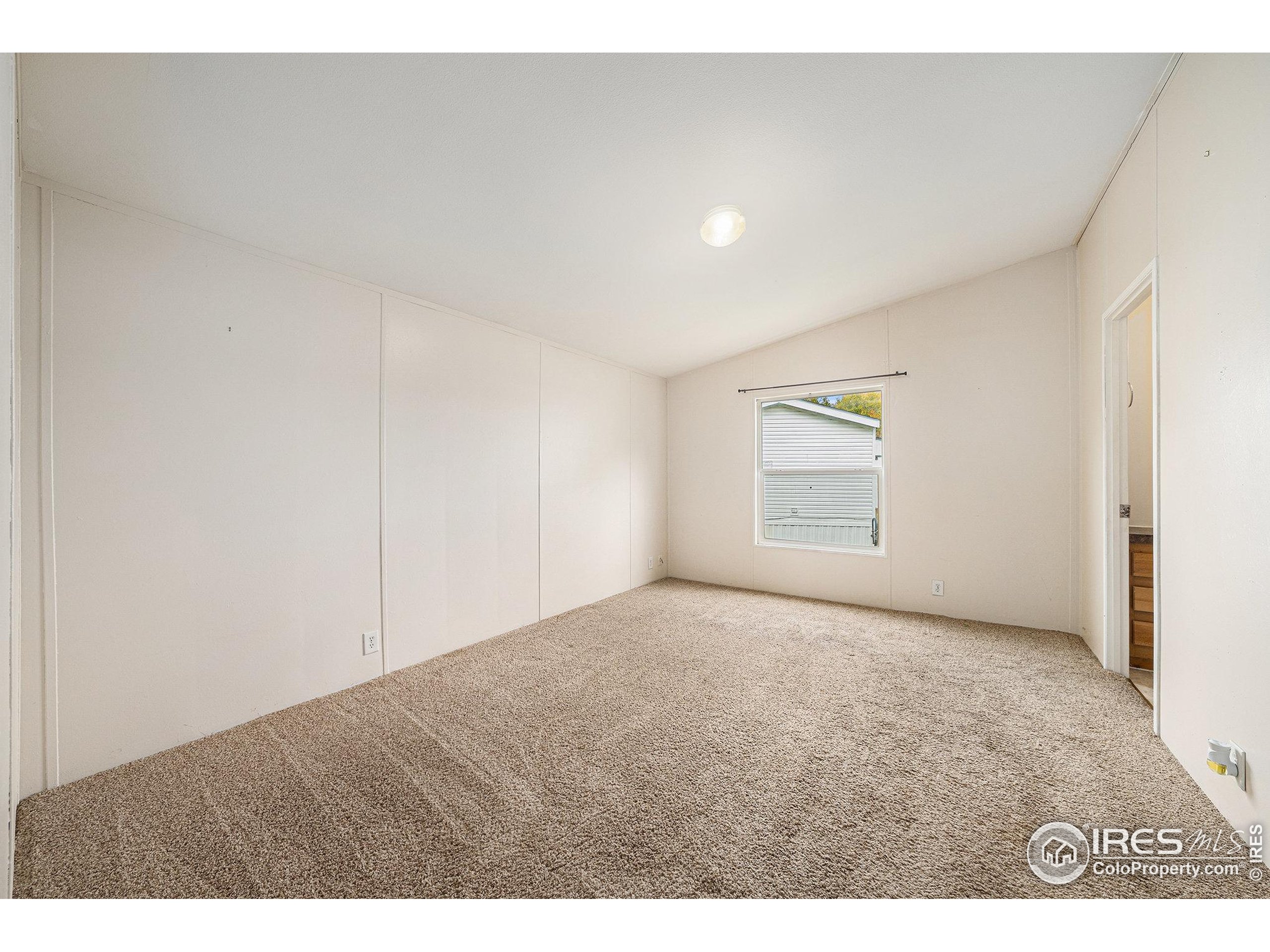 2500 East Harmony Road, Unit 191 Fort Collins, CO 80528 - Photo 9 of 22 a view of an empty room and a window
