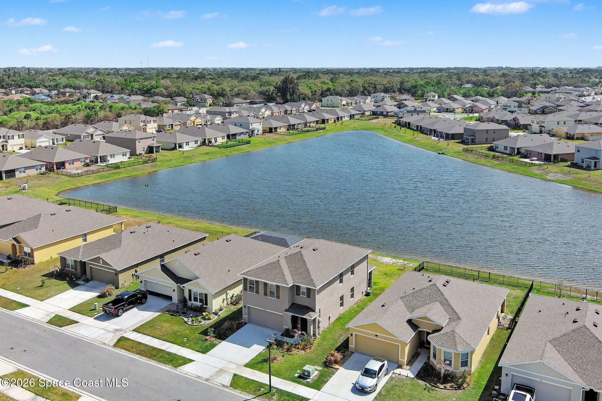 an aerial view of a house with a outdoor space