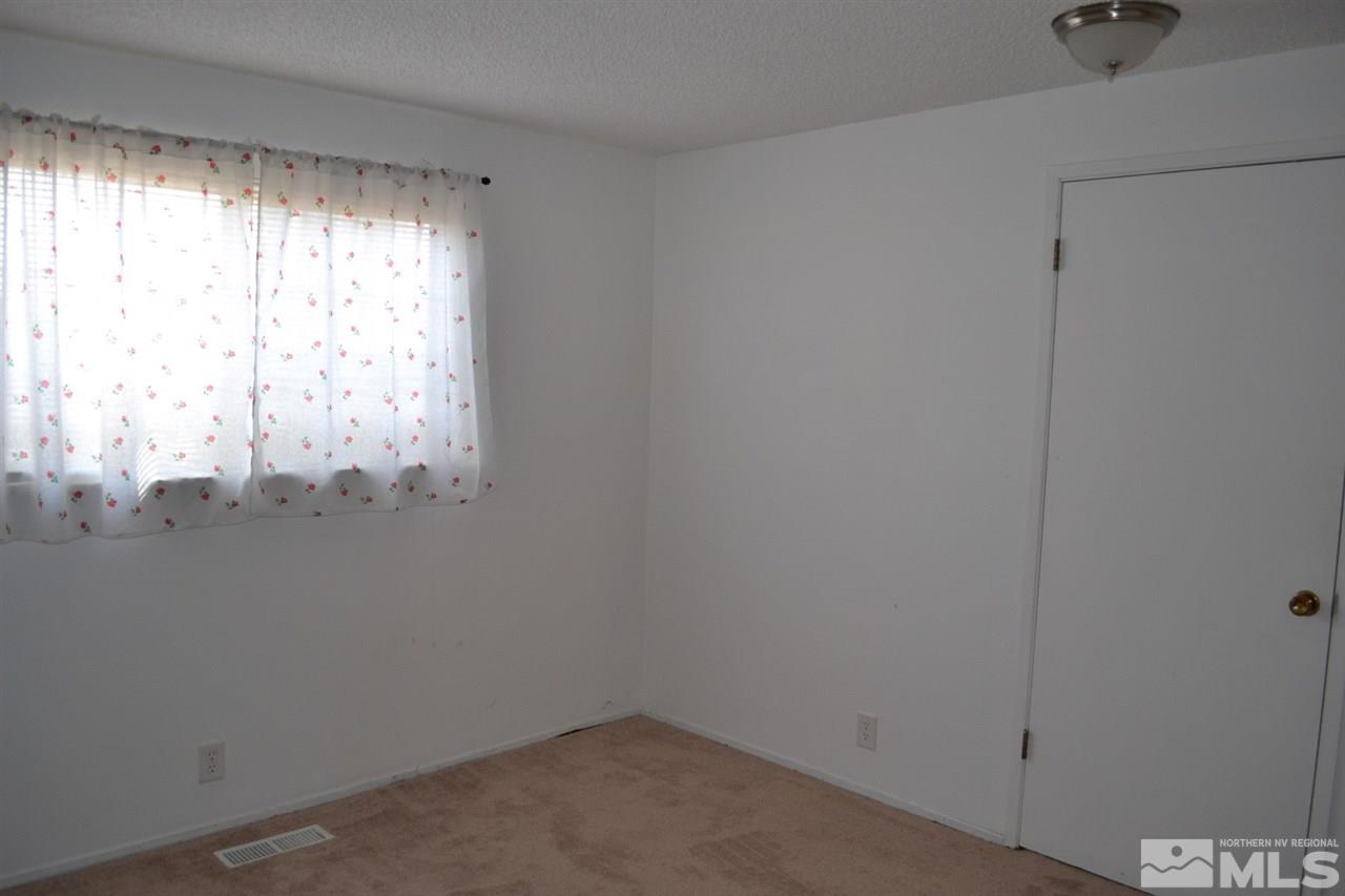 127 Ring Road Dayton, NV 89403 - Photo 12 of 24 a room with window