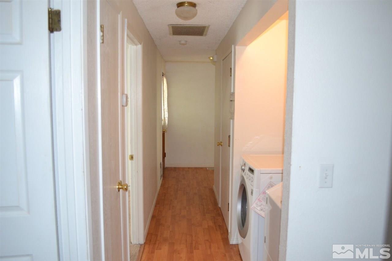 127 Ring Road Dayton, NV 89403 - Photo 10 of 24 a view of a bathroom from a hallway