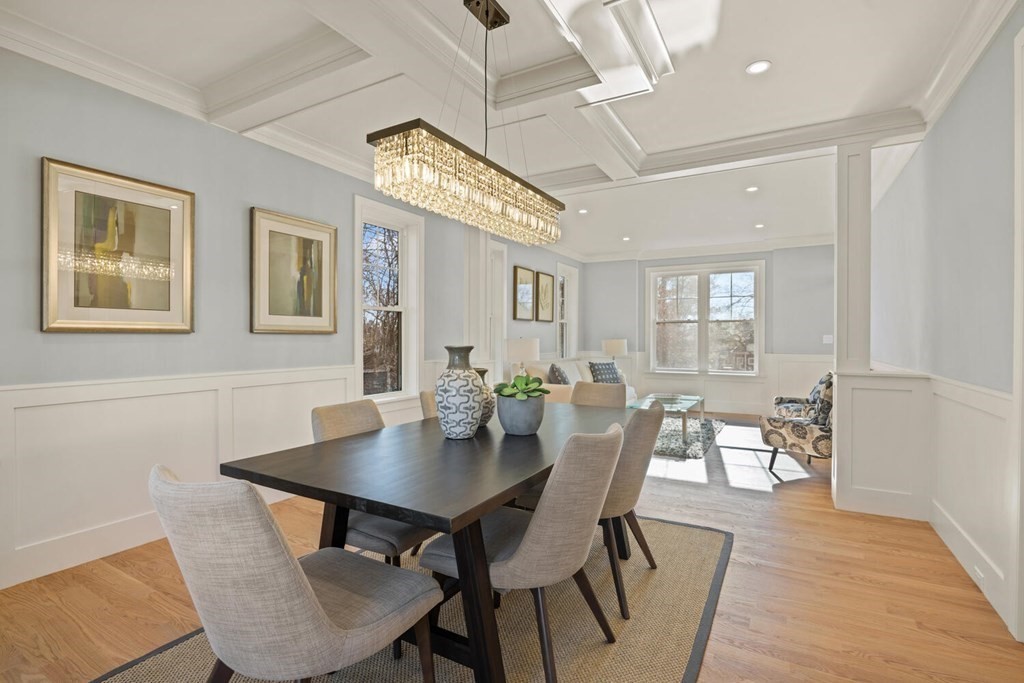 216 Concord Avenue Lexington, MA 02421 - Photo 5 of 7 a view of a dining room with furniture and wooden floor