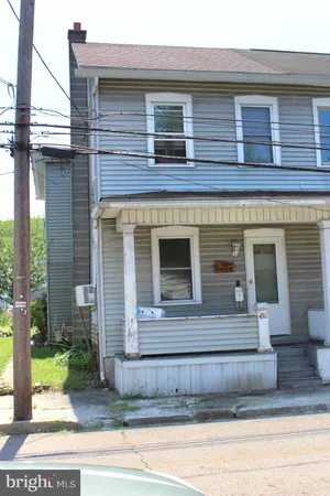a view of a house with a balcony