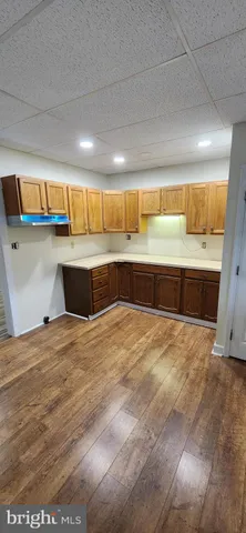 a view of kitchen with furniture and window