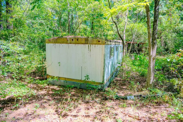 a view of a garden with a fountain