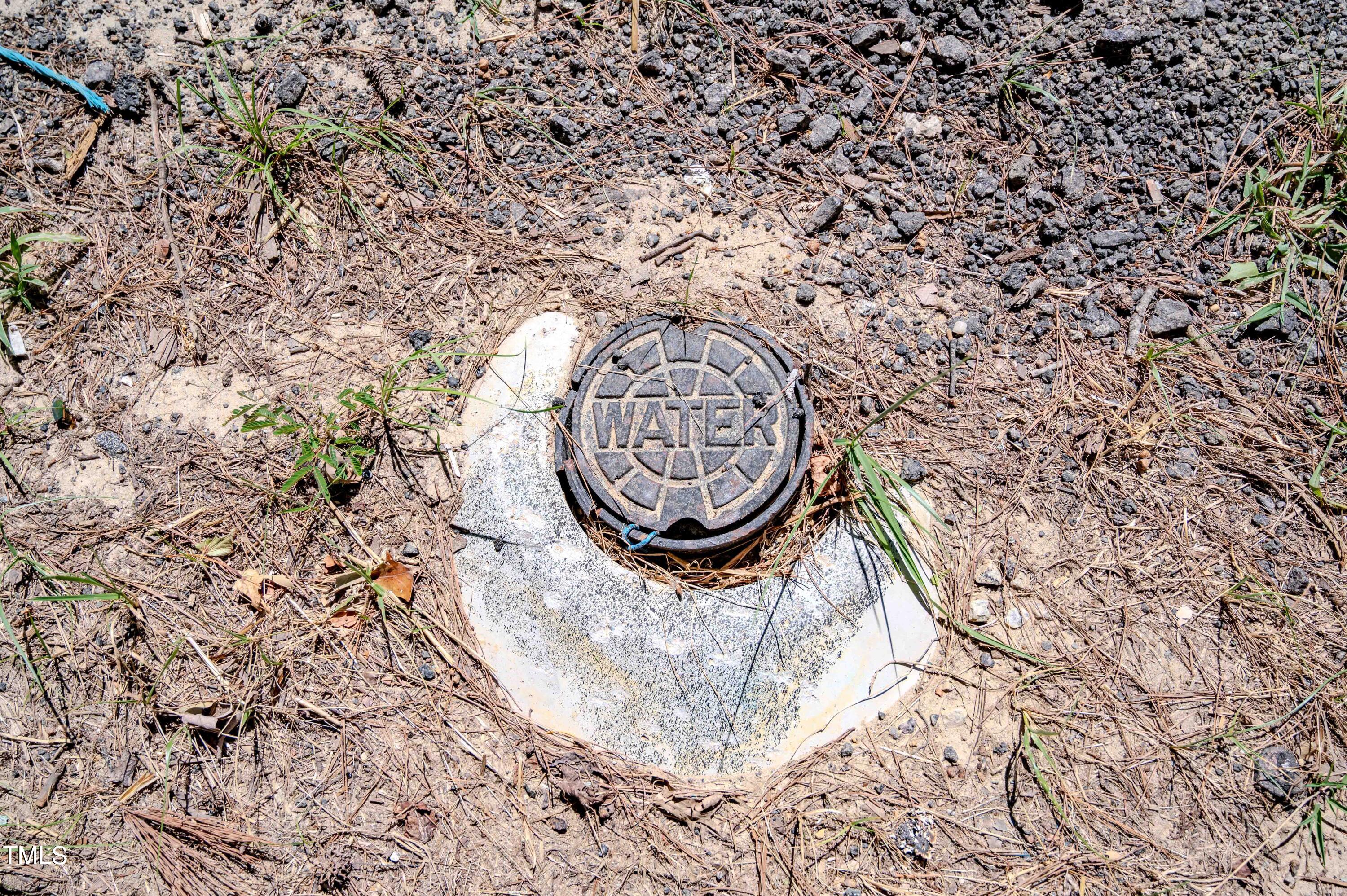 6724 Wimberly Road Willow Spring, NC 27592 - Photo 9 of 43 a picture of a bathroom with a sink and mirror
