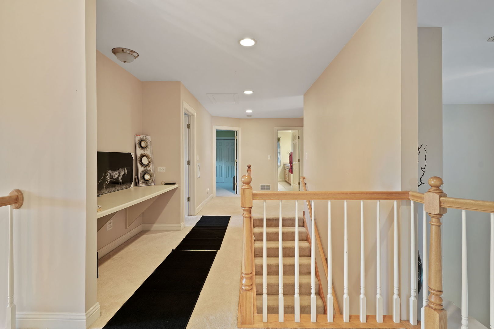 40388 Reed Court Wadsworth, IL 60083 - Photo 15 of 30 a view of a hallway with a bedroom and wooden floor