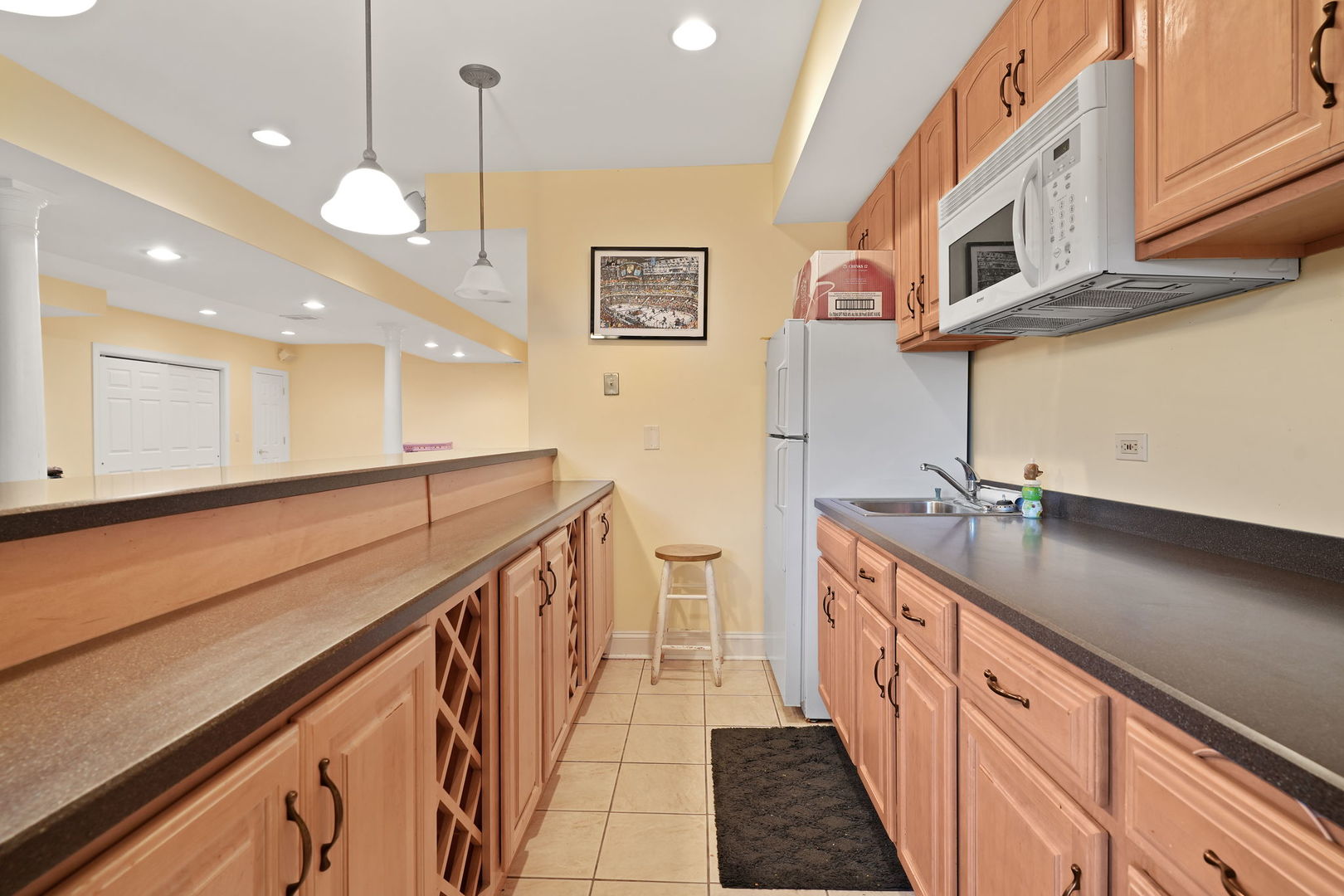 40388 Reed Court Wadsworth, IL 60083 - Photo 16 of 30 a kitchen with stainless steel appliances granite countertop a sink and stove