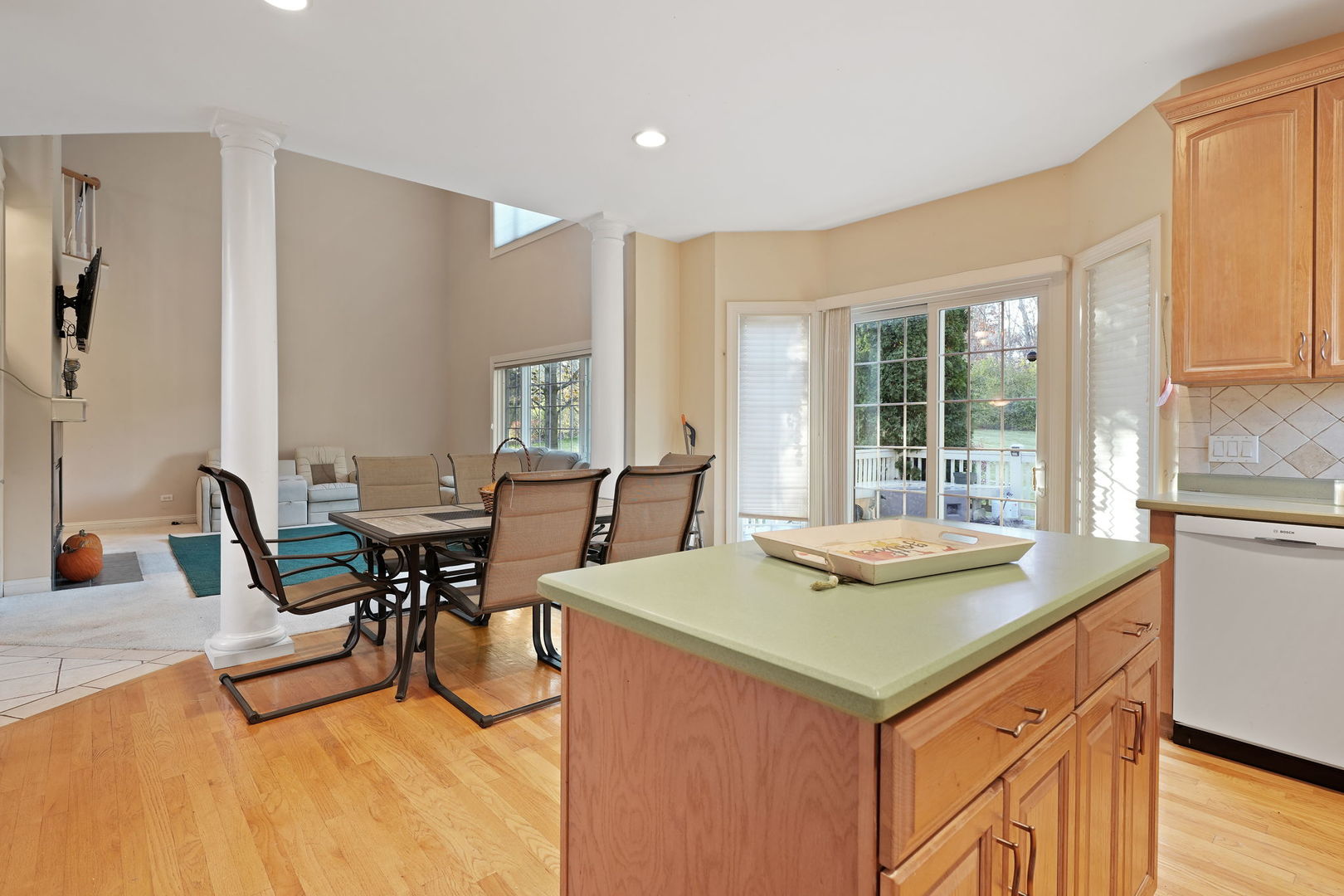 40388 Reed Court Wadsworth, IL 60083 - Photo 22 of 30 a view of a dining room with furniture and wooden floor