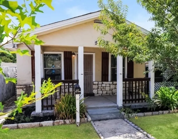 a front view of a house having yard
