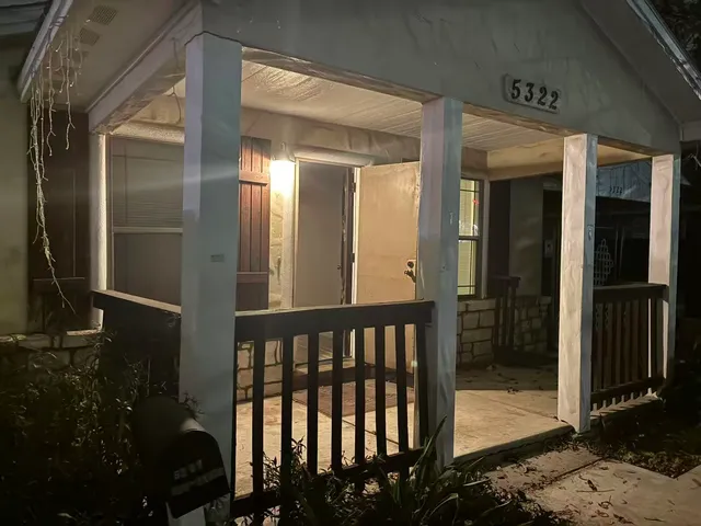 a view of a porch of a house