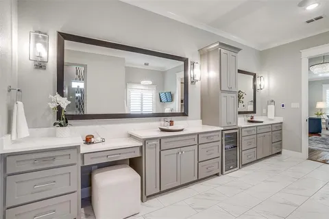 a spacious bathroom with a granite countertop sink mirror and toilet