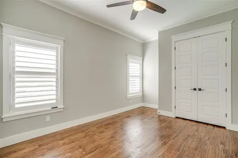 a living room with fireplace furniture and a flat screen tv