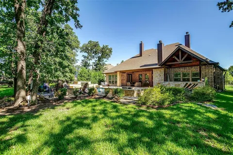 a view of a swimming pool with a lounge chair