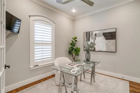 a workspace with furniture and window