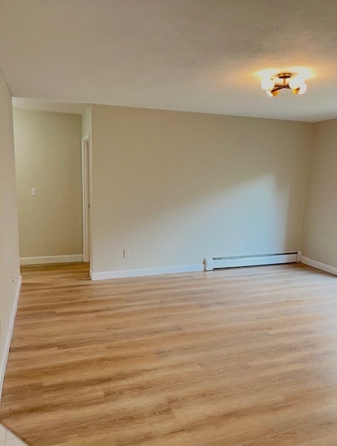 22 Westgate Road, Unit 3 Boston, MA 02467 - Photo 6 of 18 a view of an empty room