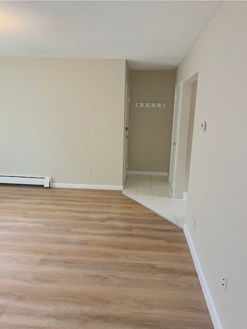 22 Westgate Road, Unit 3 Boston, MA 02467 - Photo 8 of 18 a view of an empty room