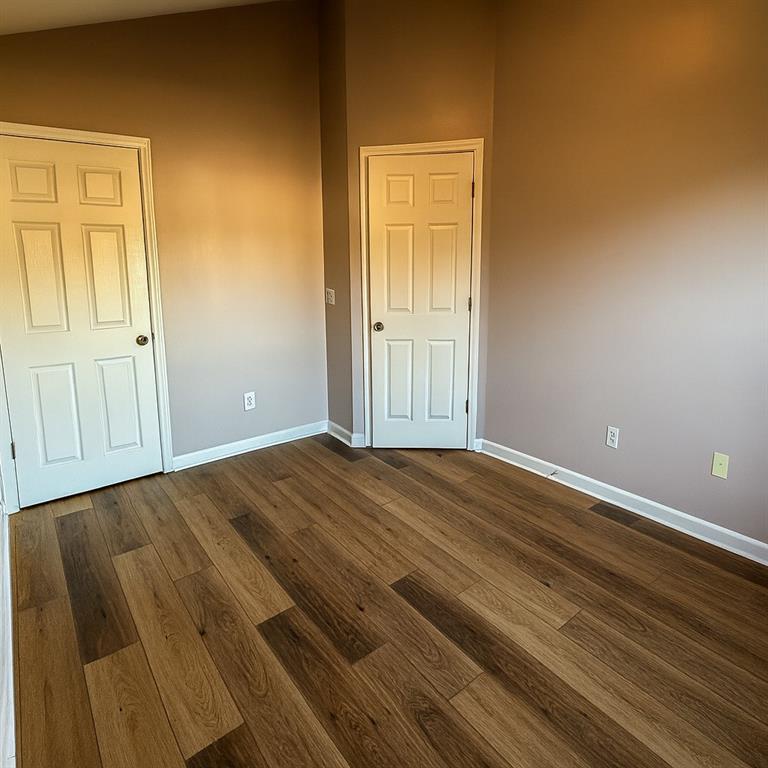 1070 Daventry Crossing Woodstock, GA 30188 - Photo 11 of 20 a view of empty room with wooden floor