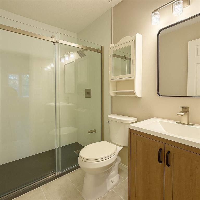 1070 Daventry Crossing Woodstock, GA 30188 - Photo 16 of 20 a bathroom with a sink toilet and shower