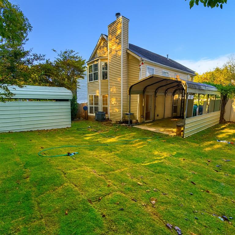 1070 Daventry Crossing Woodstock, GA 30188 - Photo 18 of 20 a front view of a house with a yard
