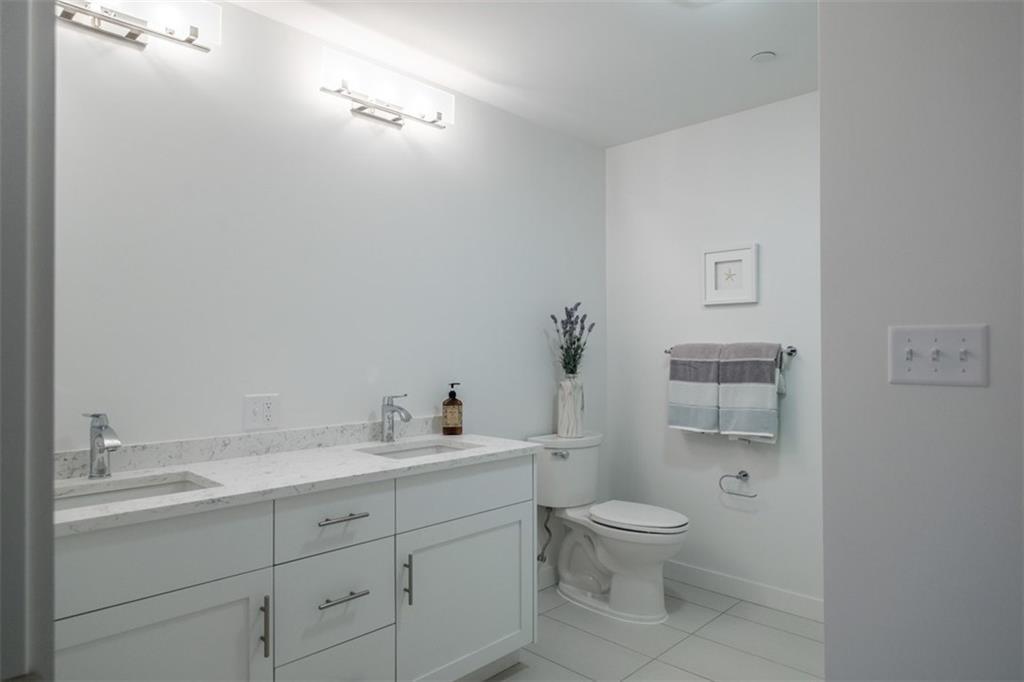 25 High Street, Unit 416 Portland, ME 04101 - Photo 18 of 28 Quartz double vanity - mirror is now...