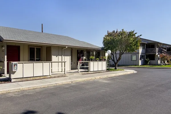 a front view of a house with a garage