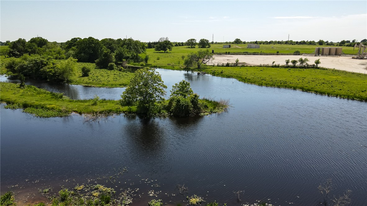 2587 JOLENE Trail Bryan, TX 77808 - Photo 3 of 7 a view of a lake with a city