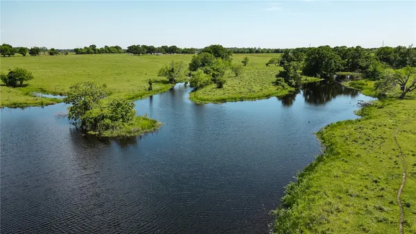 a view of a lake with a mountain in the background