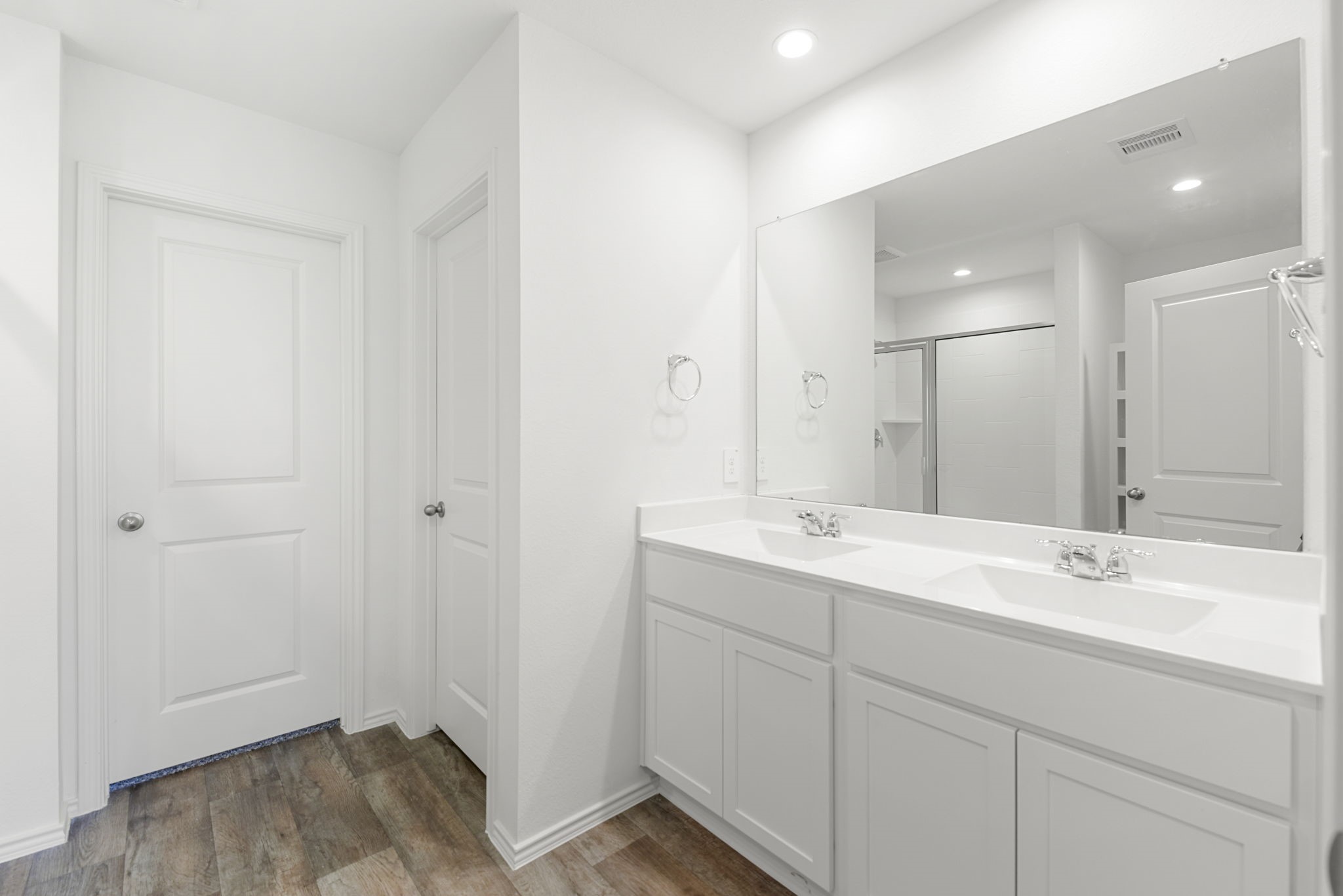 30906 Rockstock Road Fulshear, TX 77441 - Photo 27 of 43 a bathroom with a sink and a mirror