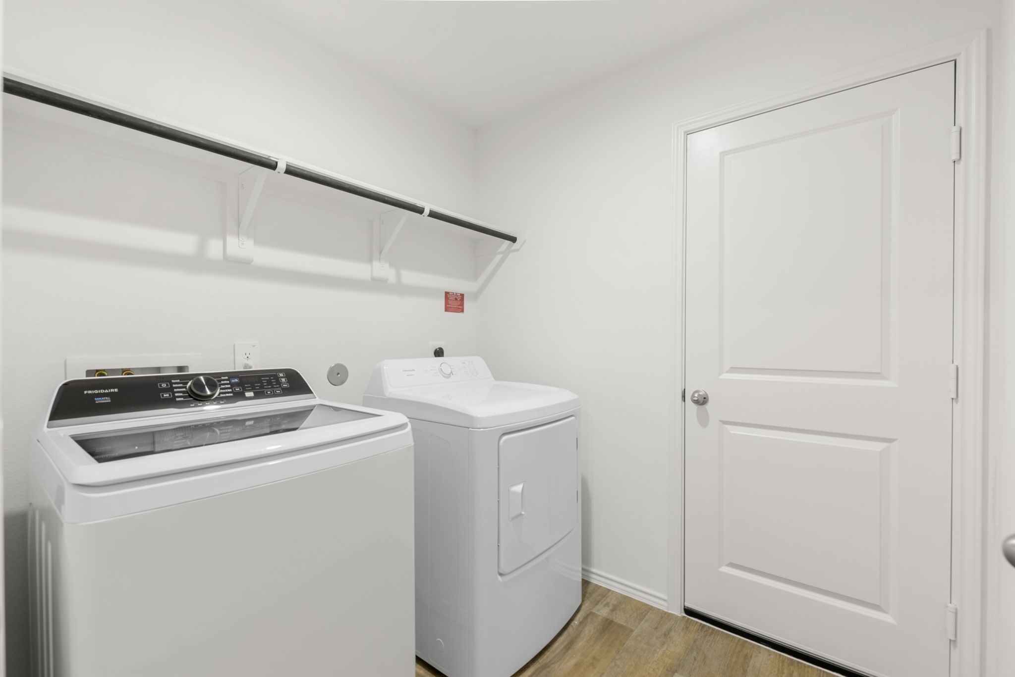 30906 Rockstock Road Fulshear, TX 77441 - Photo 30 of 43 a utility room with dryer and washer