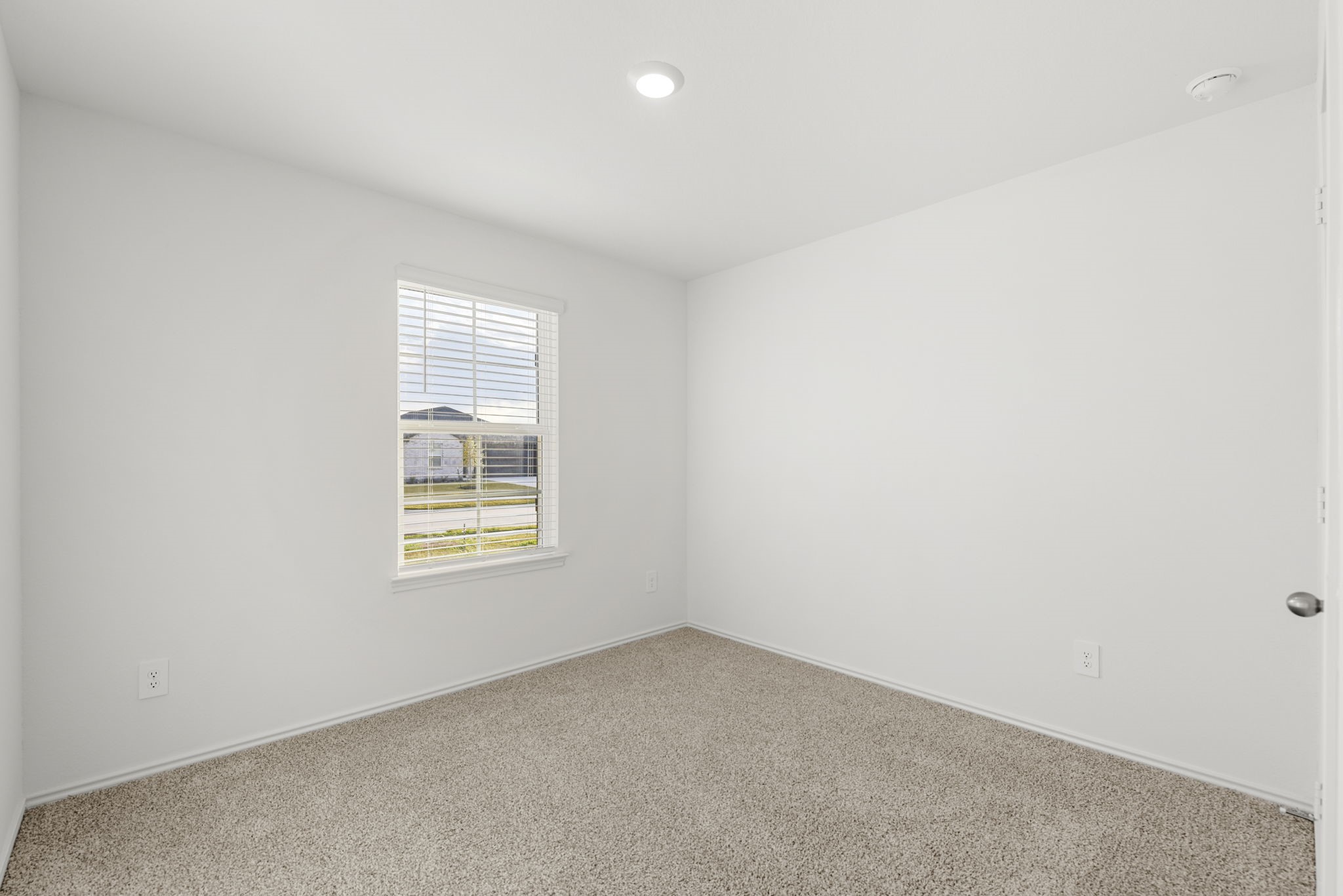 30906 Rockstock Road Fulshear, TX 77441 - Photo 34 of 43 an empty room with windows