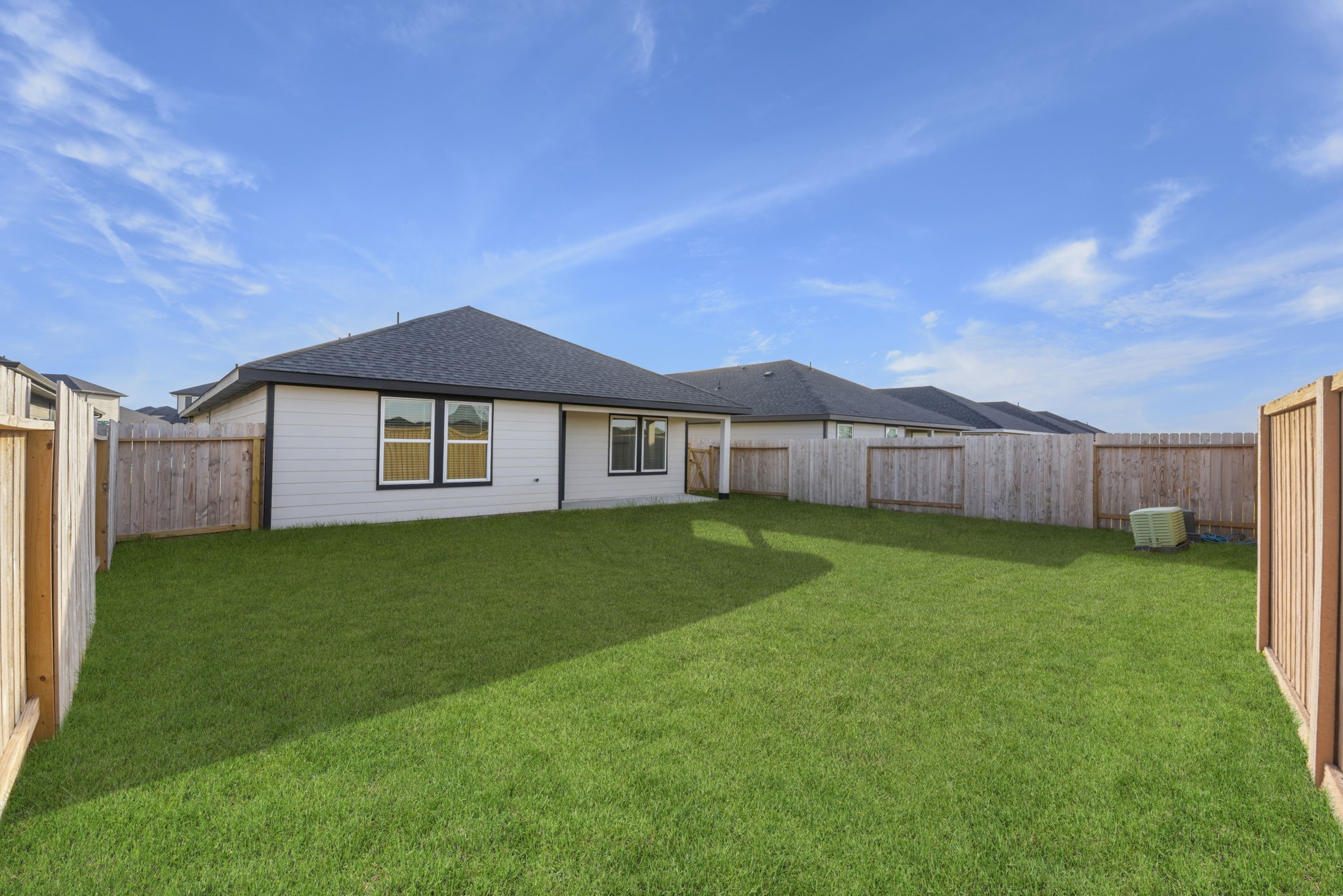 30906 Rockstock Road Fulshear, TX 77441 - Photo 43 of 43 a view of a house with a backyard