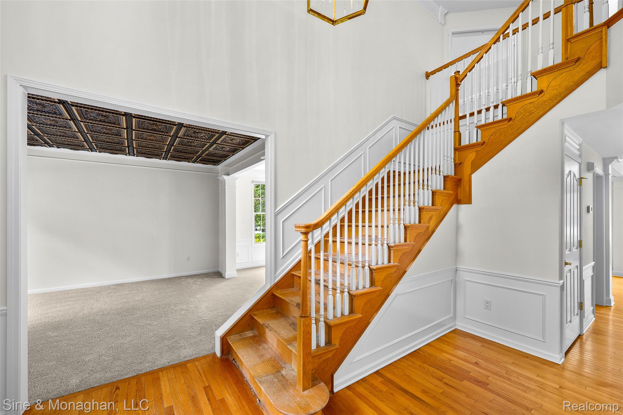 Refinish stairs or add carpet runner 